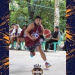 Programs 2 Energetic young man playing basketball outdoors at a church tournament during the day.
