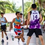 Programs 9 Active boys playing basketball at Subic Bay Baptist Ministries sports event.