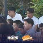 Programs 35 Group of young men attending a religious gathering outdoors at Subic Bay Baptist Ministries.