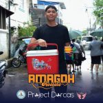 Programs 48 Clean water distribution volunteer in Subic Bay, Philippines during a community outreach event.