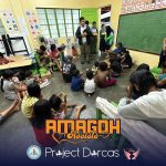 Programs 46 Children and adults gathered in a classroom at Subic Bay Baptist Ministries, engaging in a community.